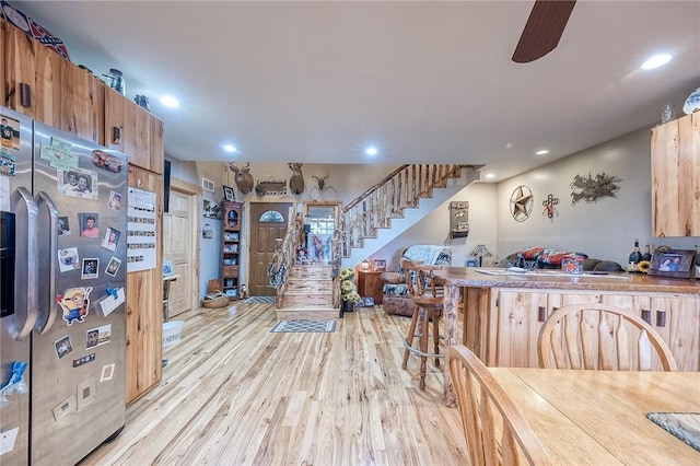 2072 Washington, Washington Twp Wml, PA 15613 - interior space with recessed lighting, stainless steel refrigerator with ice dispenser, open floor plan, and light wood-style flooring