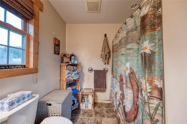 2072 Washington, Washington Twp Wml, PA 15613 - bathroom featuring a shower with shower curtain, visible vents, toilet, and tile patterned floors
