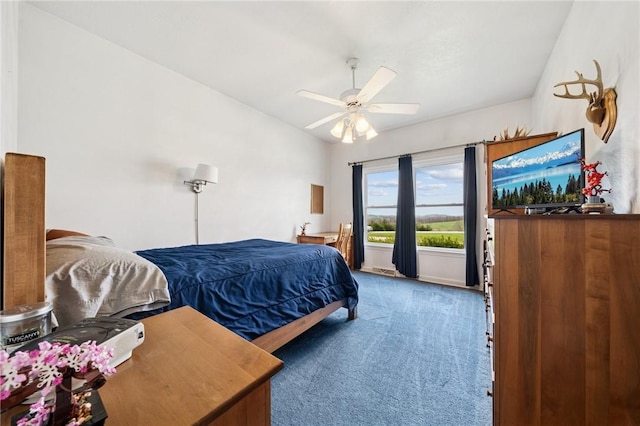 carpeted bedroom with a ceiling fan