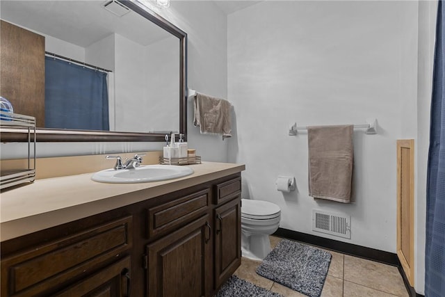 2240 Chapparal Dr, Plum Boro, PA 15239 - bathroom featuring vanity, toilet, tile patterned flooring, and visible vents