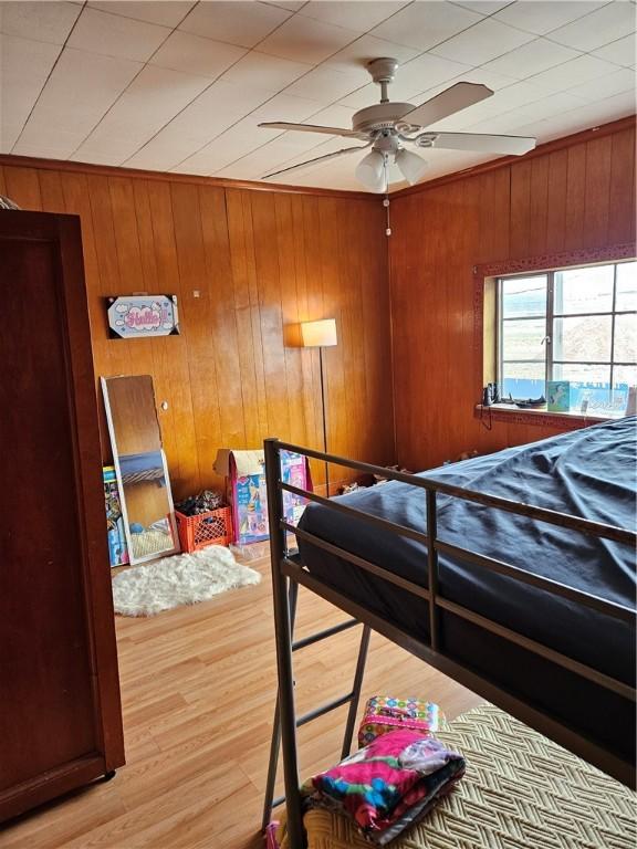 113 Ohio St, Stowe Twp, PA 15136 - bedroom featuring wooden walls and wood finished floors
