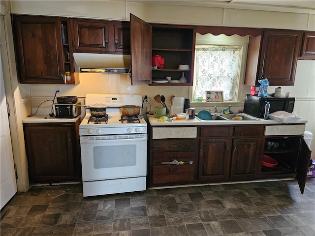 3026 Zephyr Ave, Sheraden, PA 15204 - kitchen featuring a sink, black microwave, light countertops, under cabinet range hood, and white gas stove