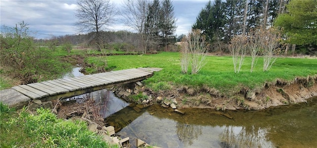 surrounding community with a lawn