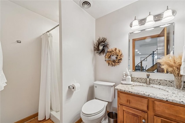 bathroom with visible vents, toilet, baseboards, and a shower with curtain