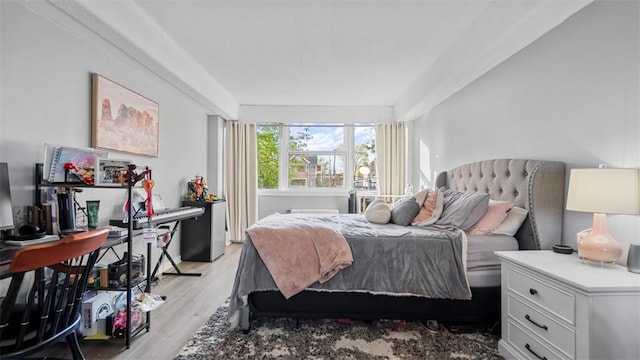 bedroom with light wood-type flooring