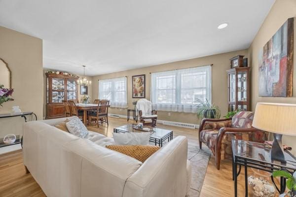 1420 Fernledge Dr, Shaler, PA 15101 - living room featuring an inviting chandelier and light wood finished floors