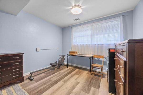 1420 Fernledge Dr, Shaler, PA 15101 - office area with baseboards, visible vents, and wood finished floors