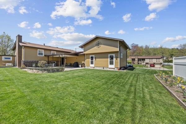 1420 Fernledge Dr, Shaler, PA 15101 - back of property featuring a patio and a yard