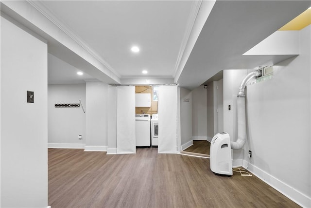 159 Inglewood Dr, Mt Lebanon, PA 15228 - basement featuring wood finished floors, washer and dryer, baseboards, ornamental molding, and recessed lighting