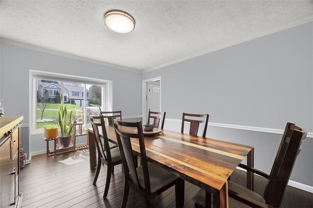 216 Briar Path, North Fayette, PA 15126 - dining space with crown molding, a textured ceiling, hardwood / wood-style floors, and baseboards