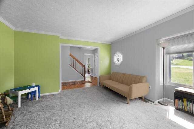 216 Briar Path, North Fayette, PA 15126 - living area featuring carpet floors, stairway, ornamental molding, a textured ceiling, and baseboards