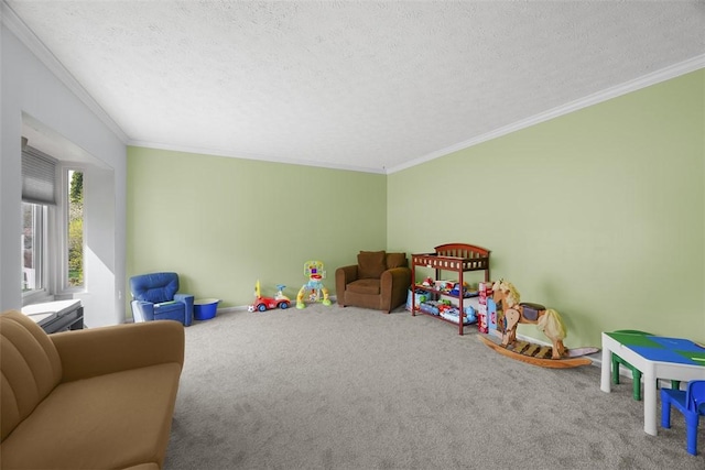 playroom featuring carpet, a textured ceiling, crown molding, and baseboards