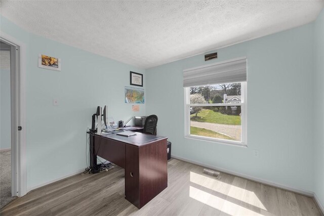 216 Briar Path, North Fayette, PA 15126 - office featuring light wood-type flooring, a textured ceiling, and baseboards