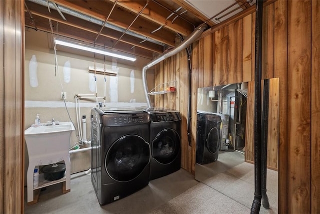laundry area with washing machine and clothes dryer