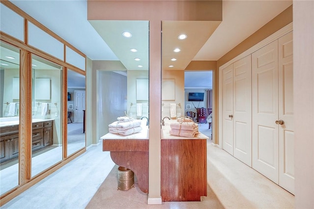 office space featuring recessed lighting, light carpet, and french doors
