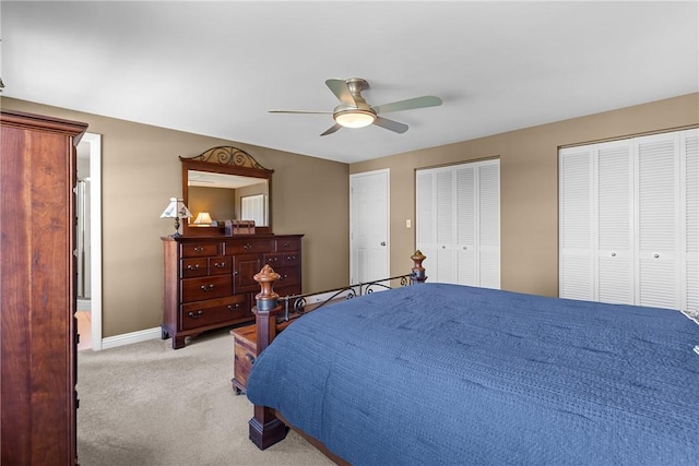 3216 Postgate Dr, Bethel Park, PA 15102 - carpeted bedroom featuring multiple closets, a ceiling fan, and baseboards