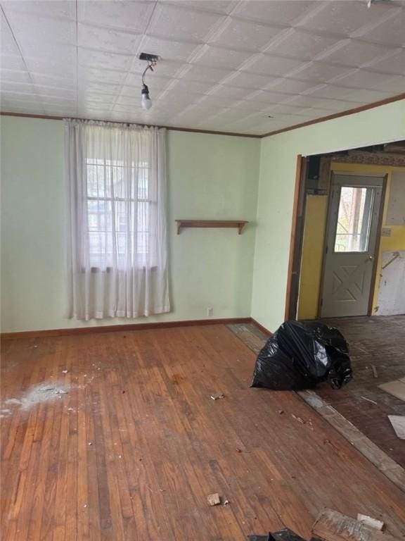1501 Stewart St, New Kensington, PA 15068 - unfurnished living room with hardwood / wood-style flooring and baseboards