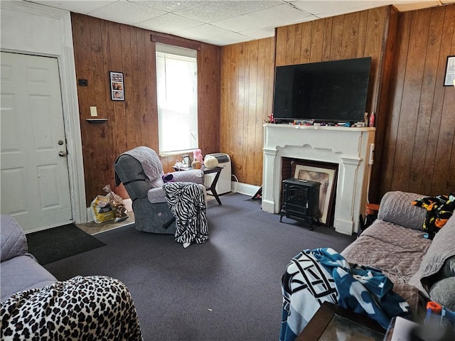316-318 Tabor St, Esplen, PA 15204 - living room with a fireplace with flush hearth, wooden walls, and dark colored carpet