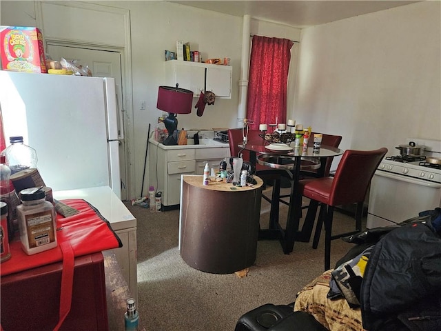 316-318 Tabor St, Esplen, PA 15204 - kitchen featuring carpet floors and white appliances