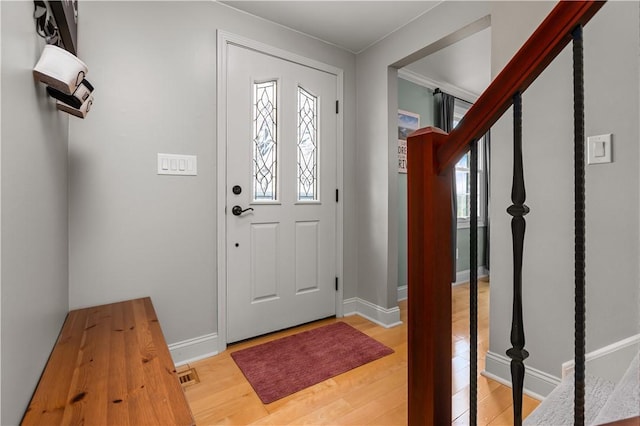 104 Textor Dr N, Versailles, PA 15137 - entryway with healthy amount of natural light and light wood-type flooring