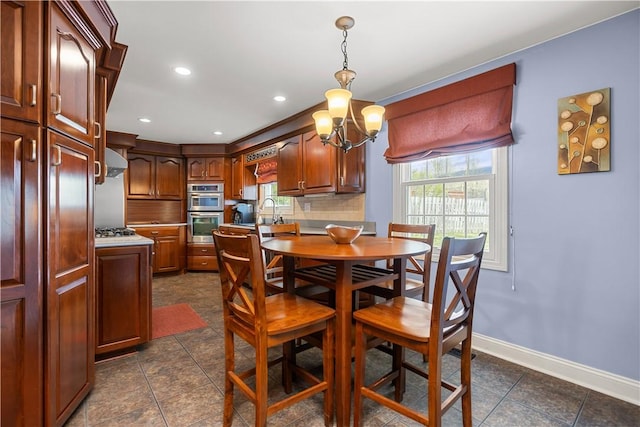 104 Textor Dr N, Versailles, PA 15137 - dining space with recessed lighting, a chandelier, and dark tile patterned floors