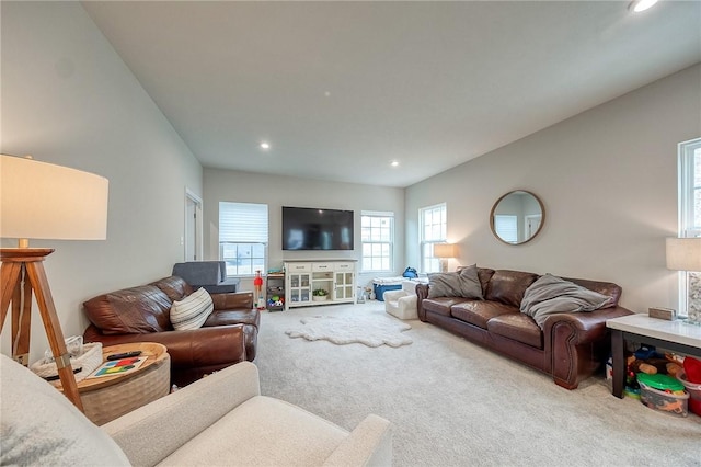 carpeted living room featuring recessed lighting