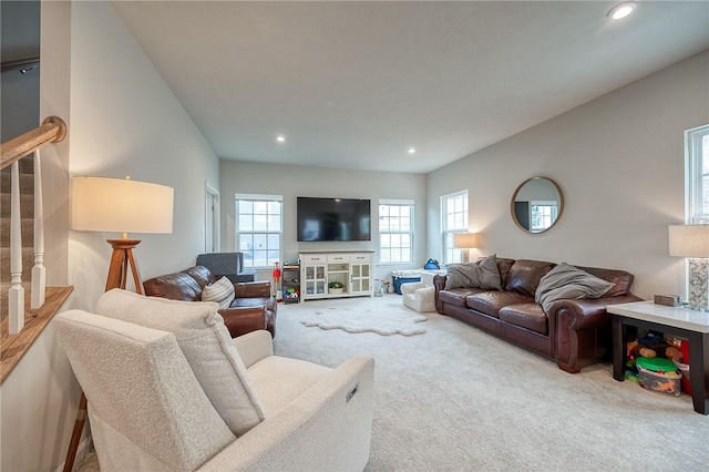 carpeted living room with recessed lighting