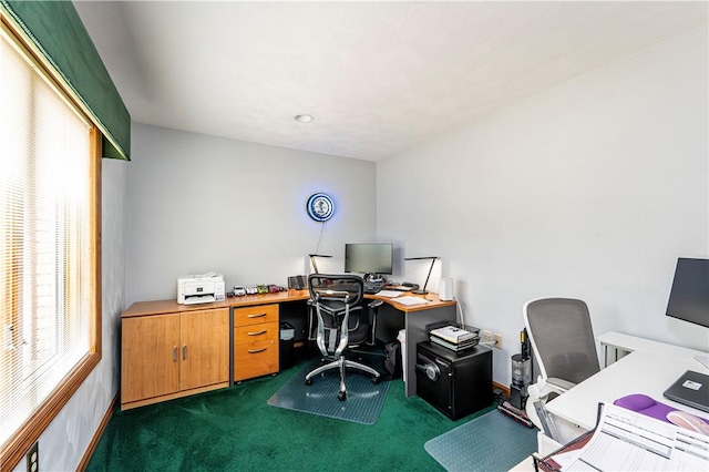 office space featuring dark colored carpet
