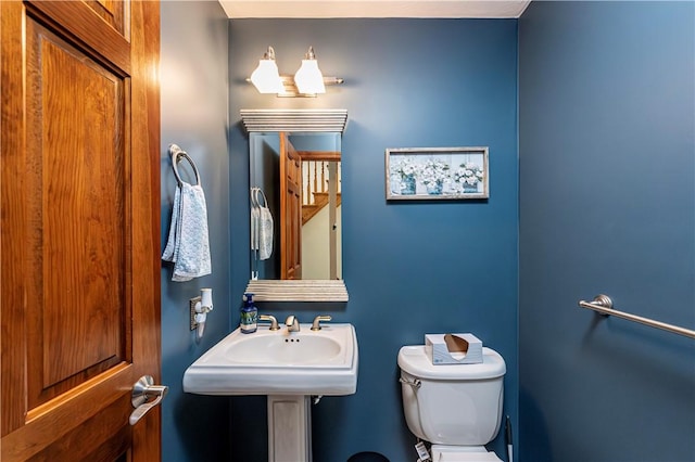 bathroom featuring a sink and toilet