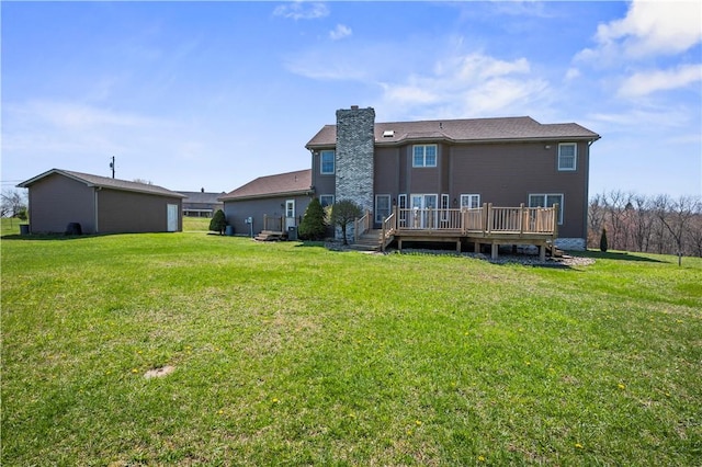 322 Cole Rd, Buffalo Twp But, PA 16055 - rear view of property with a chimney, a wooden deck, and a yard