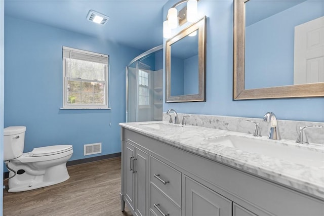 2007 Garrick Dr, Churchill Boro, PA 15235 - bathroom with visible vents, a sink, and toilet