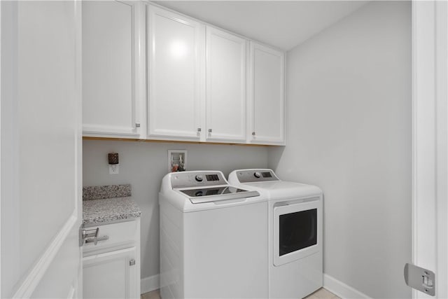 342 Juniper Way, Peters Twp, PA 15317 - laundry room with cabinet space, baseboards, and separate washer and dryer