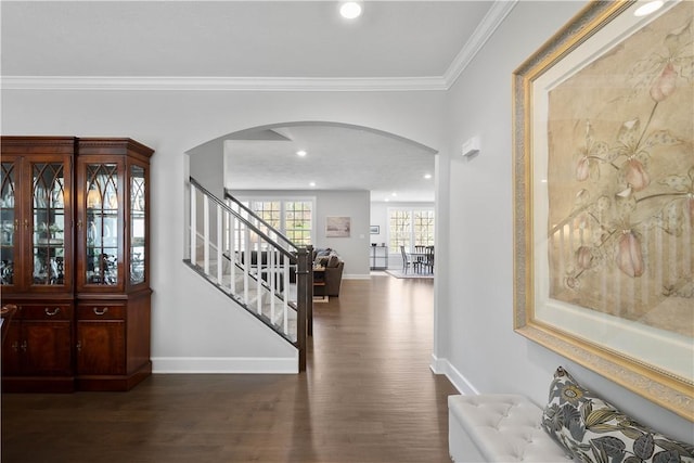 342 Juniper Way, Peters Twp, PA 15317 - hall featuring arched walkways, baseboards, wood finished floors, stairway, and crown molding