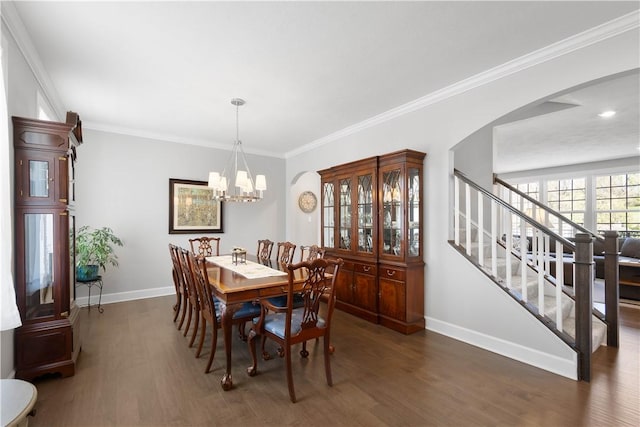 342 Juniper Way, Peters Twp, PA 15317 - dining room featuring a notable chandelier, wood finished floors, arched walkways, baseboards, and ornamental molding