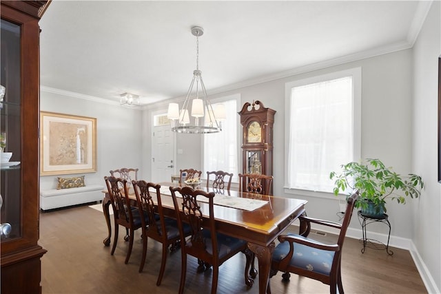 342 Juniper Way, Peters Twp, PA 15317 - dining room featuring baseboards, crown molding, wood finished floors, and a chandelier