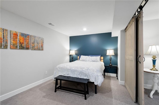 342 Juniper Way, Peters Twp, PA 15317 - bedroom featuring a barn door, baseboards, visible vents, and light carpet