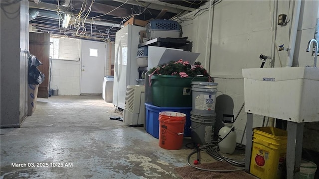 basement with a sink