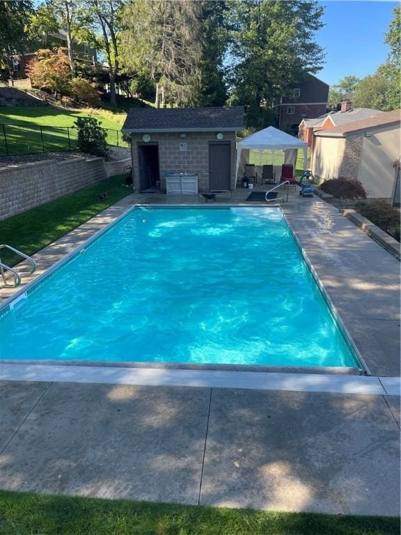 86 Lambeth Dr, Upper St Clair, PA 15241 - view of swimming pool with a patio area, a fenced backyard, a fenced in pool, and an outdoor structure