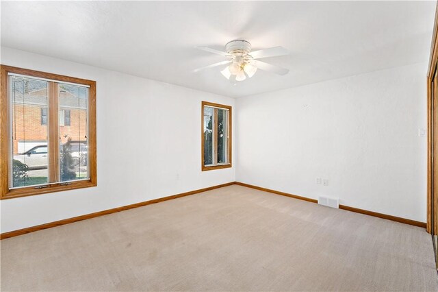 86 Lambeth Dr, Upper St Clair, PA 15241 - unfurnished room featuring light colored carpet, ceiling fan, baseboards, and visible vents