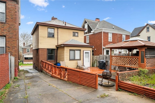 1323 Methyl St, Beechview, PA 15216 - back of house featuring a gazebo, fence, a patio area, a deck, and an outdoor fire pit