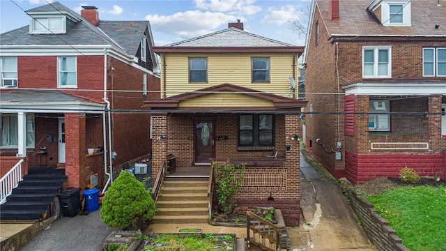 1323 Methyl St, Beechview, PA 15216 - view of front of house with a porch, brick siding, and stairs