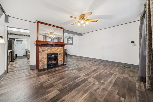 1323 Methyl St, Beechview, PA 15216 - unfurnished living room with wood finished floors, a ceiling fan, baseboards, and a stone fireplace