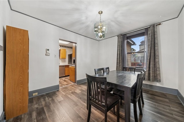 1323 Methyl St, Beechview, PA 15216 - dining room featuring baseboards, wood finished floors, and a chandelier