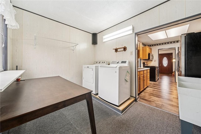 1323 Methyl St, Beechview, PA 15216 - laundry room with separate washer and dryer, light wood finished floors, laundry area, and light colored carpet