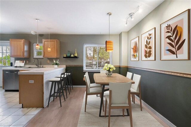 814 Greenfield Ave, Greenfield, PA 15217 - dining area with light wood finished floors and plenty of natural light