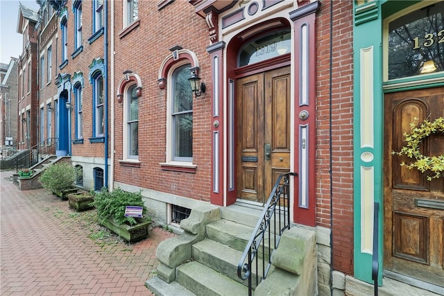 1319 Sheffield St, Manchester, PA 15233 - view of exterior entry featuring brick siding