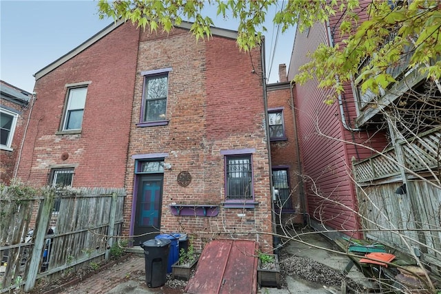 1319 Sheffield St, Manchester, PA 15233 - back of house with fence and brick siding