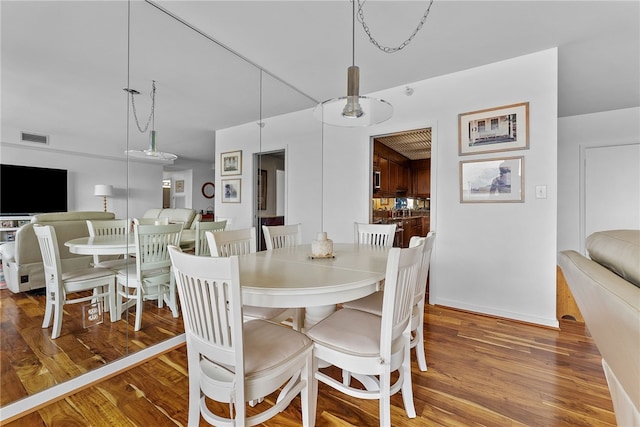 750 Washington Rd Unit 904, Mt Lebanon, PA 15228 - dining room featuring wood finished floors and visible vents