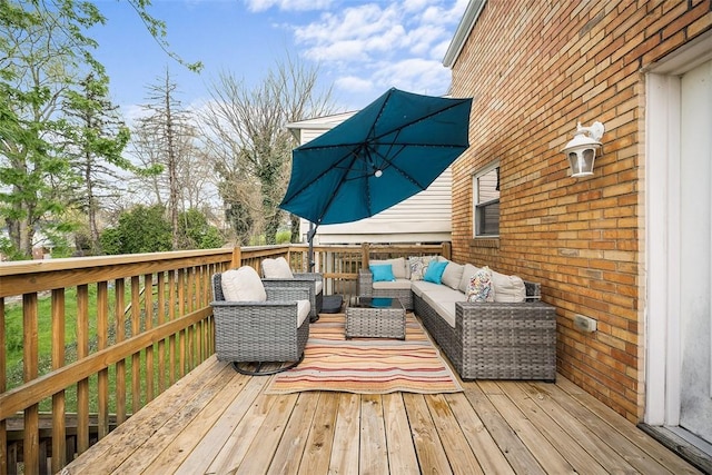 wooden deck with an outdoor hangout area