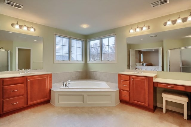 404 Plum Ct, Cranberry Twp, PA 16066 - ensuite bathroom with a shower stall, a garden tub, and two vanities